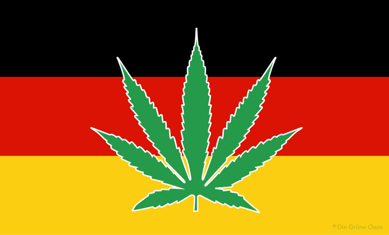 Eine Deutschlandflagge mit dem Hanf-Symbol im Vordergrund